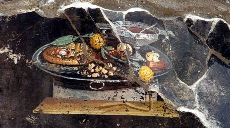 Hallan un posible 'antepasado' de la pizza en un fresco en Pompeya