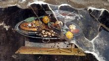 Hallan un posible 'antepasado' de la pizza en un fresco en Pompeya