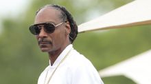 Snoop Dog aprende a nadar con Michael Phelps