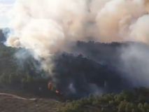 
La lluvia ayuda a dar por estabilizado el incendio forestal en Tuéjar 

 