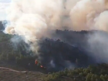 
La lluvia ayuda a dar por estabilizado el incendio forestal en Tuéjar 

 